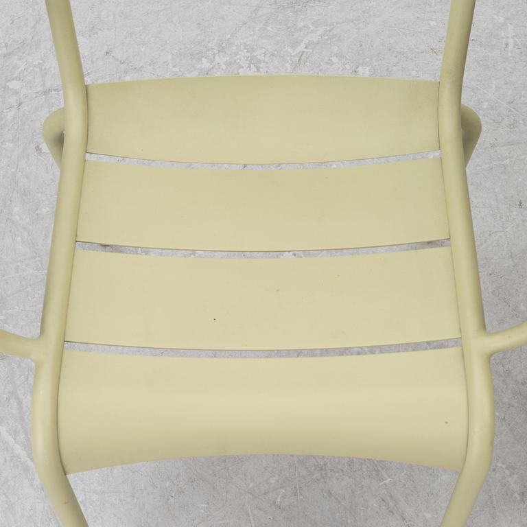 Frédéric Sofia, a table and two chairs for outdoor use, "Luxembourg" Fermob, France, 21st century.