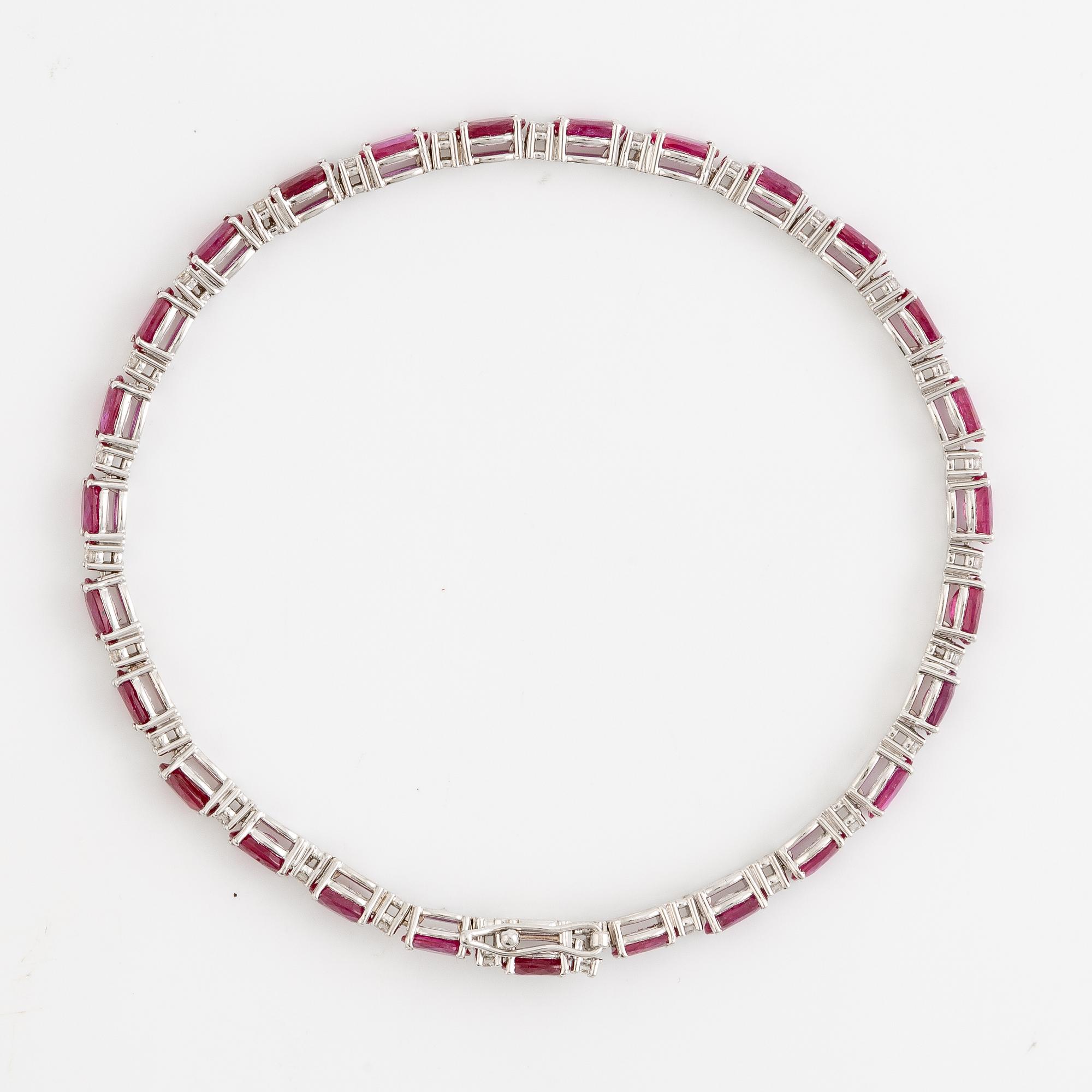 Bracelet 18K white gold with rubies and brilliant-cut diamonds.