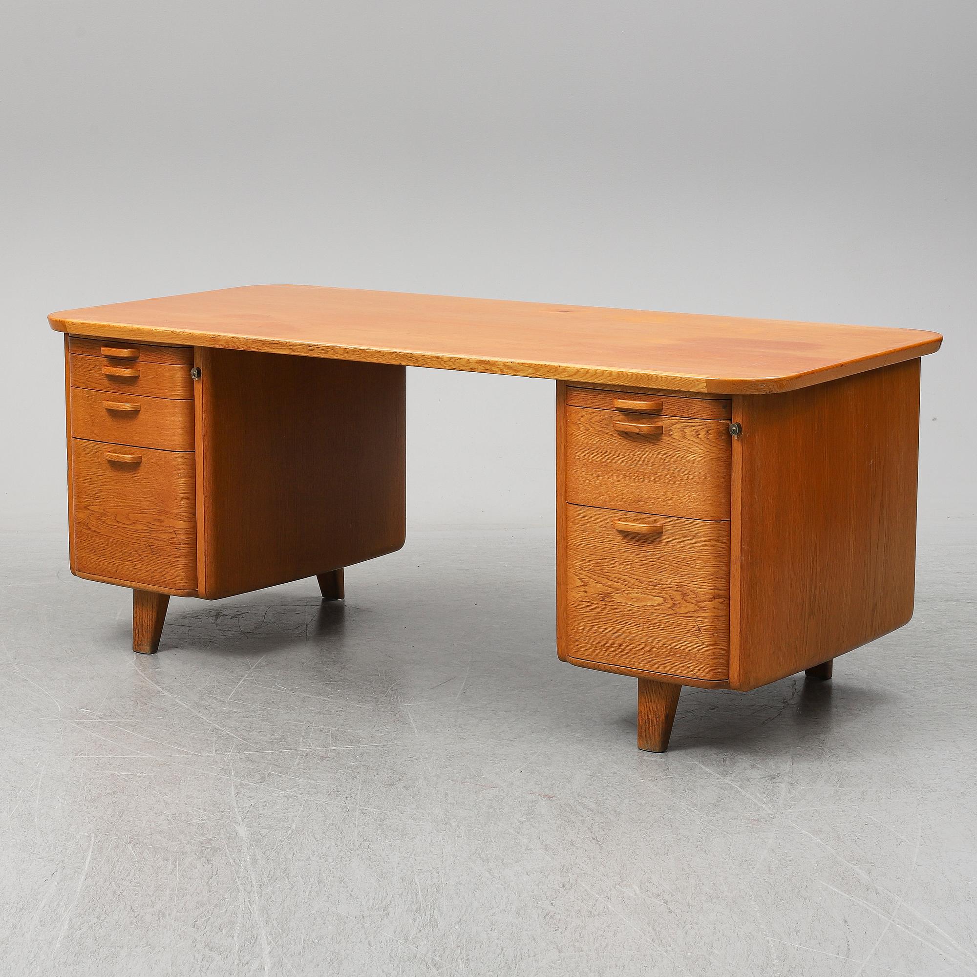 A 1950/60's oak writing desk.