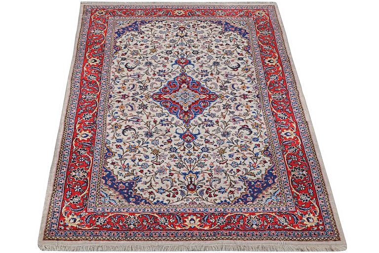 An oriental rug, c. 231 x 143 cm.