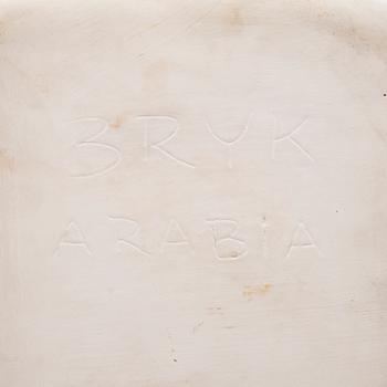 A ceramic plate signed Bryk Arabia.