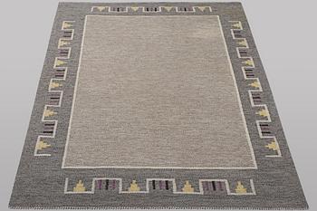 A carpet, flat weave, ca 240 x 165 cm.