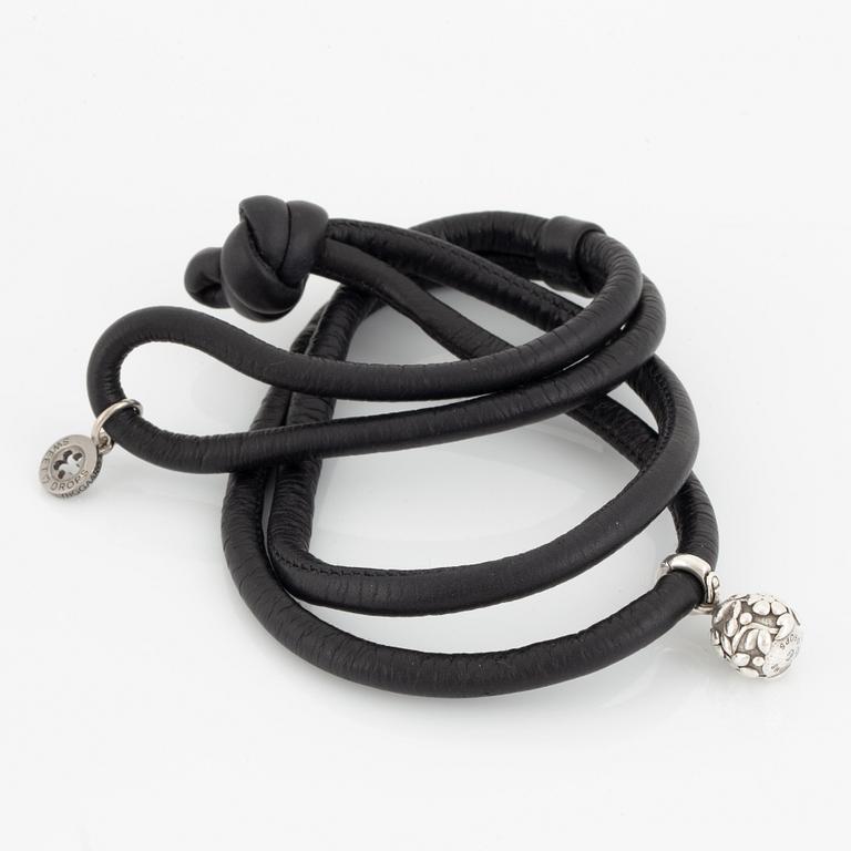 OLE LYNGGAARD,  "sweet drops", armband samt berlock i silver med briljantslipad diamant.