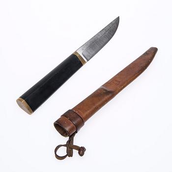 PUUKKO-KNIV, rostfritt stål, nylon och mässing, Tapio Wirkkala. Formgiven 1961.