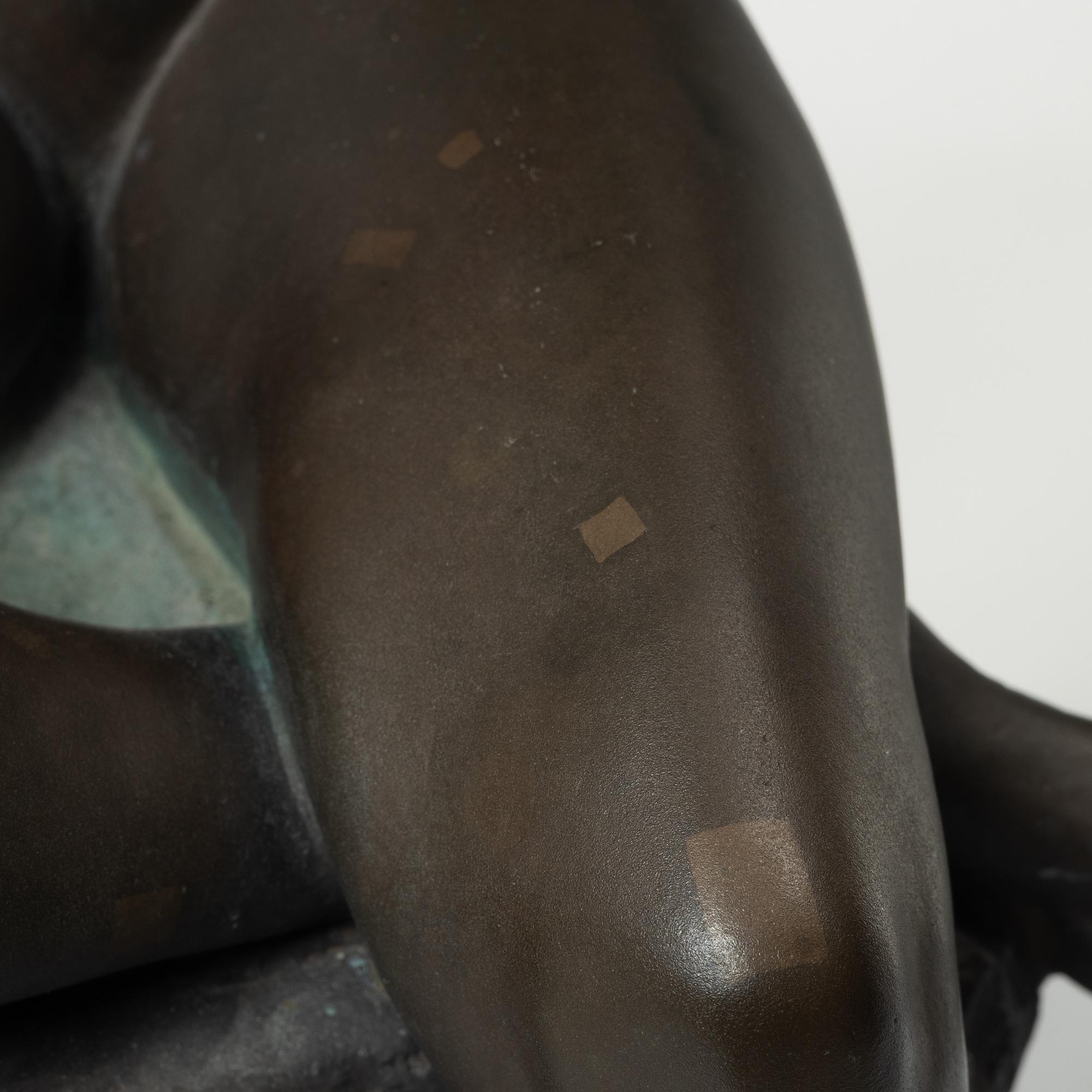 Alice Nordin, seated female figure.