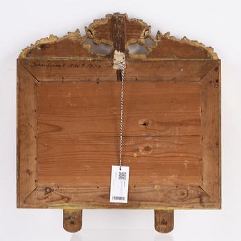A pair of Swedish Empire mirror wall sconces, first half of the 19th century.
