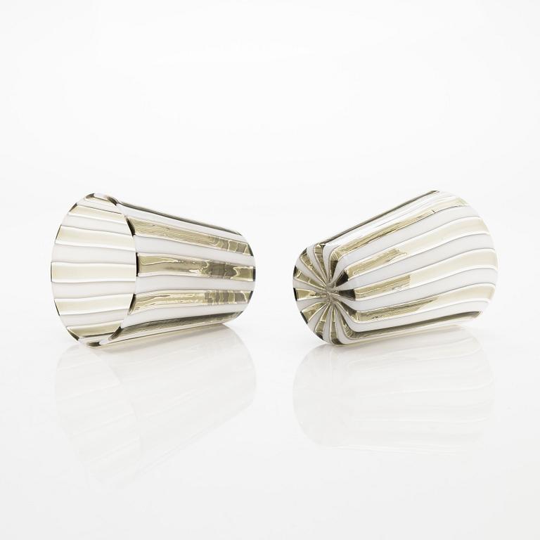 Gio Ponti, a glass bottle '4500' signed Venini, Murano and three drinking glasses, Italy.