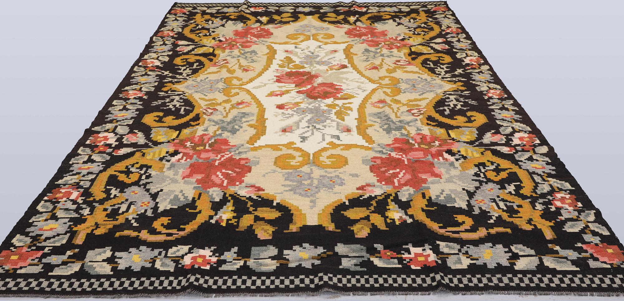 An older Bessarabian Kelim carpet 340 x 203 cm.