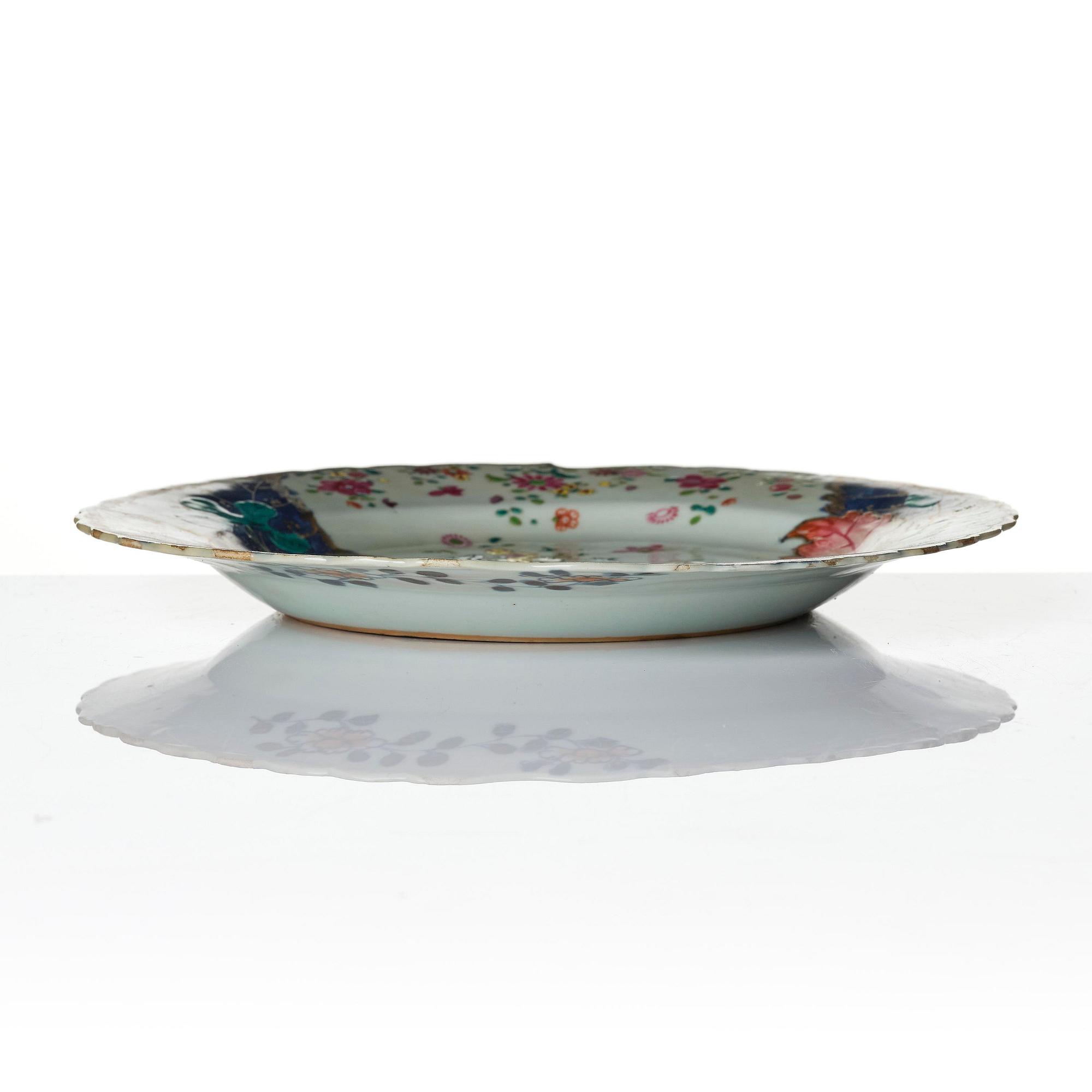 A set of three famille rose 'tobacco leaf' plates, Qing dynasty, Qianlong (1736-95).
