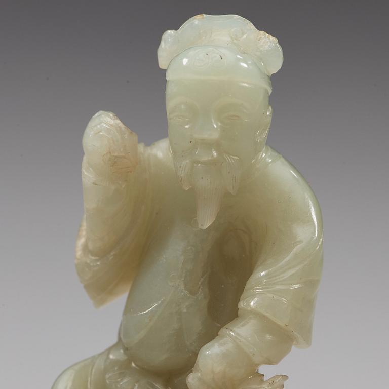 A nephrite sculpture of a man, Qing dynasty (1644-1912).