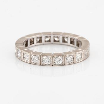 An 18K white gold Cartier ring set with round brilliant-cut diamonds.