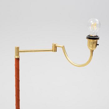 A brass floor lamp from EWÅ, second part of the 20th Century.