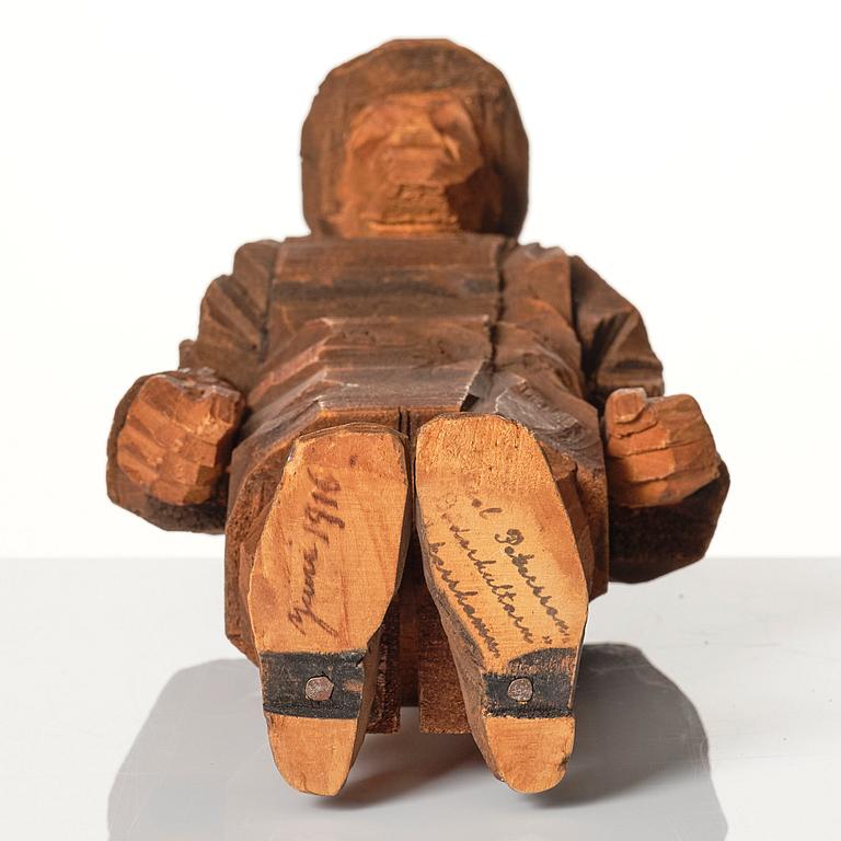 Axel Petersson Döderhultarn, Man with hat.