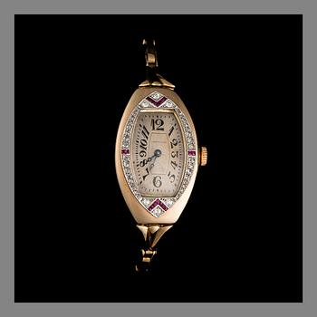 A WRIST WATCH, Longines, gold 56, rose cut diamonds and rubies. Russian hallmarks St. Petersburg 1910s.