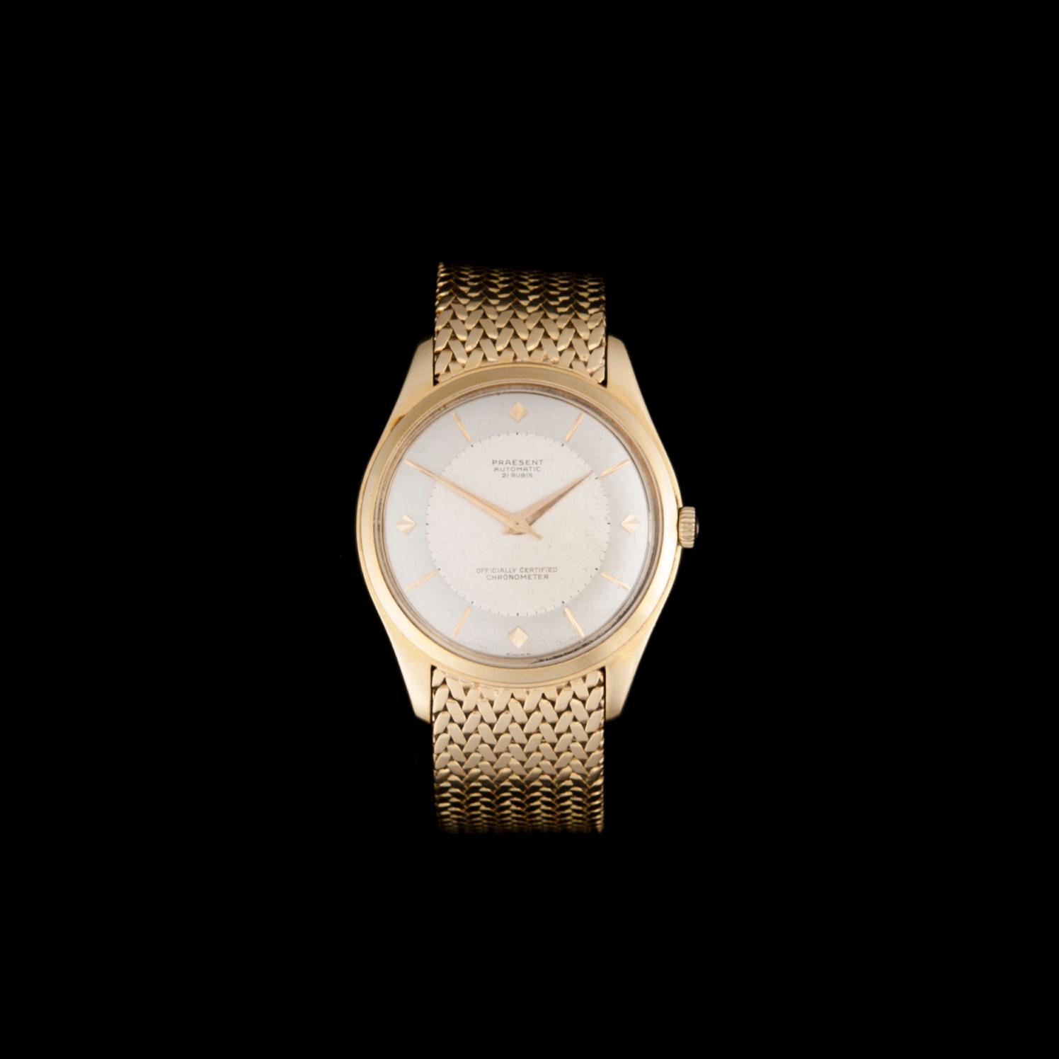 ARMBANDSUR, herr, guld 14 k, Praesent Automatic. Armband 18k guld, totalvikt 90 g.