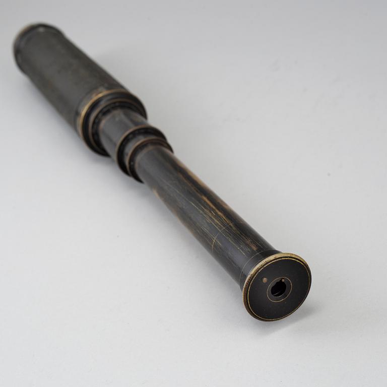A telescope, circa 1900.