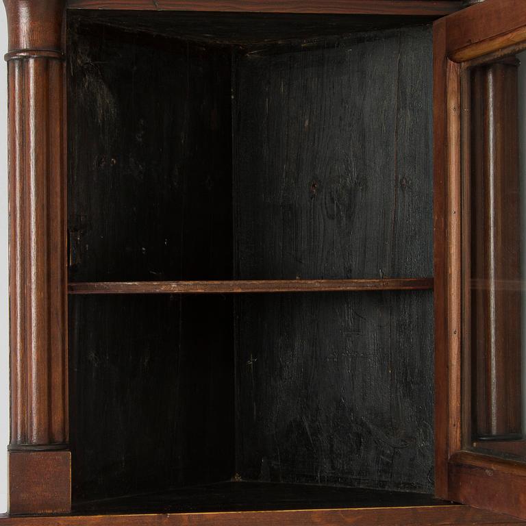 A mid-19th-century wall cabinet.