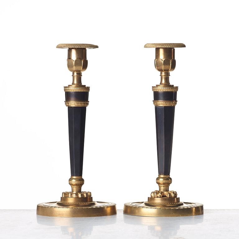 A pair of French Directoire candlesticks, circa 1800.