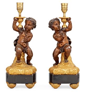 A pair of Louis XVI-style circa 1900 table lamps.