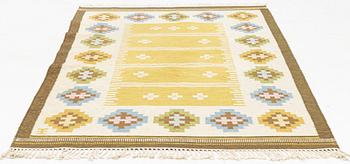 A flat weave carpet, signed EE, ca 242 x 170 cm.