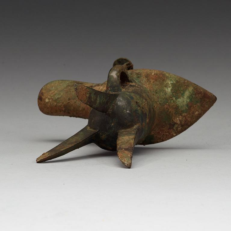 A bronze ritural tripod wine vessel 'Jue', presumably Shang dynasty, 12/11th Century BC.