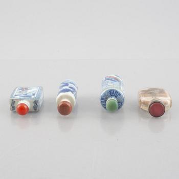 A group of nine Chinese glass and porcelain snuffbottles, 20th century.