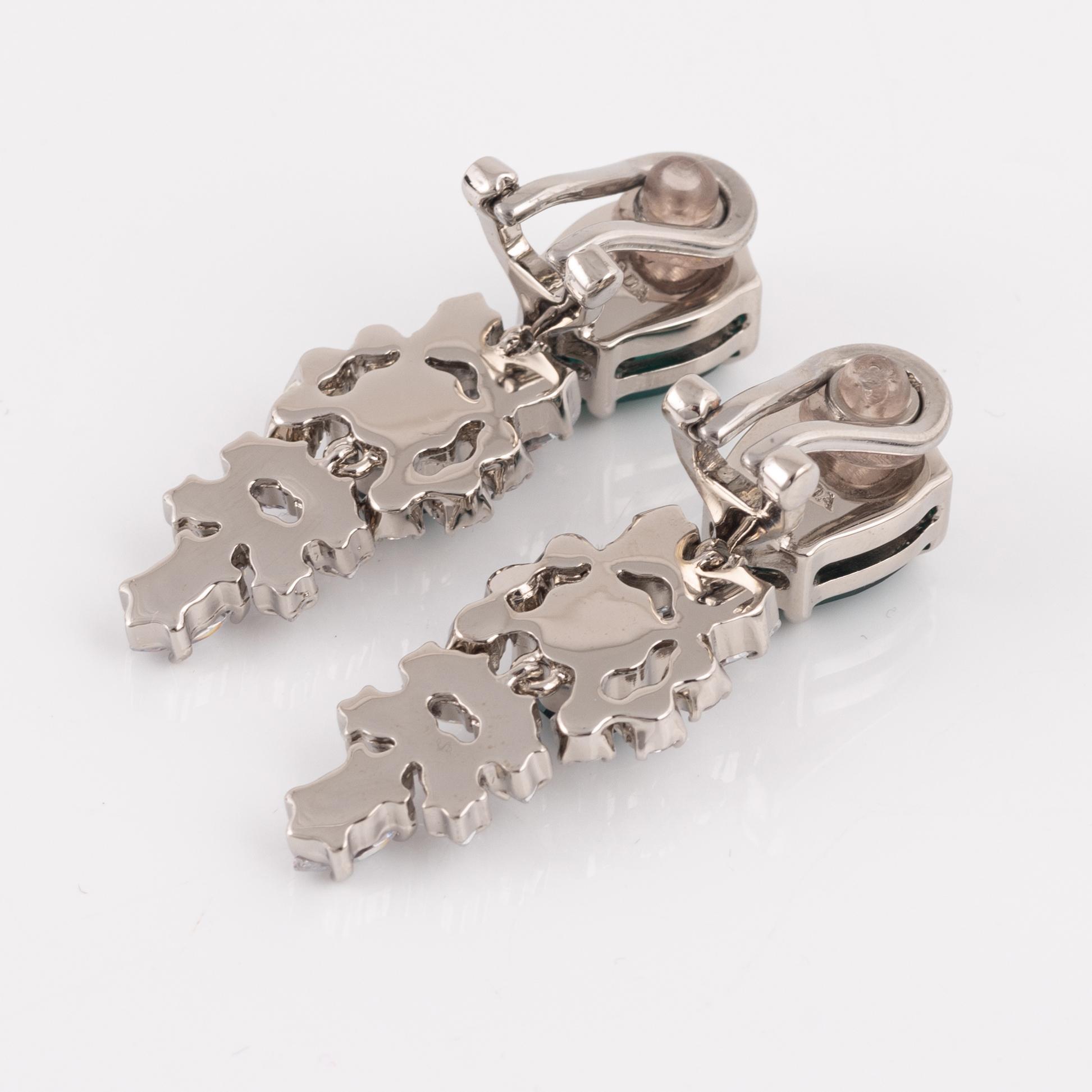Prada, a pair of clip-on rhinestone and strass earrings.