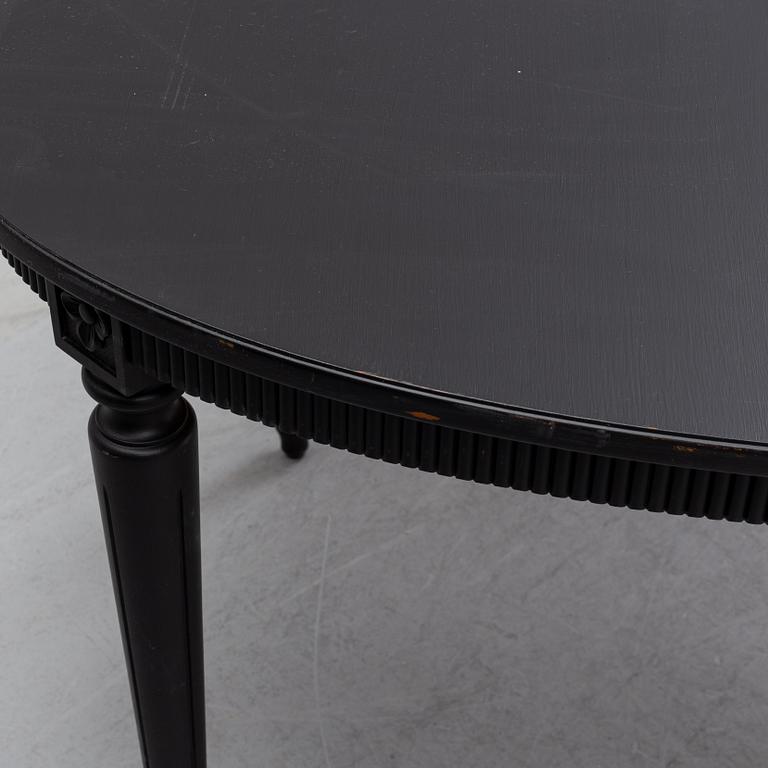 A painted Gustavian style dining table, second half of the 20th Century.