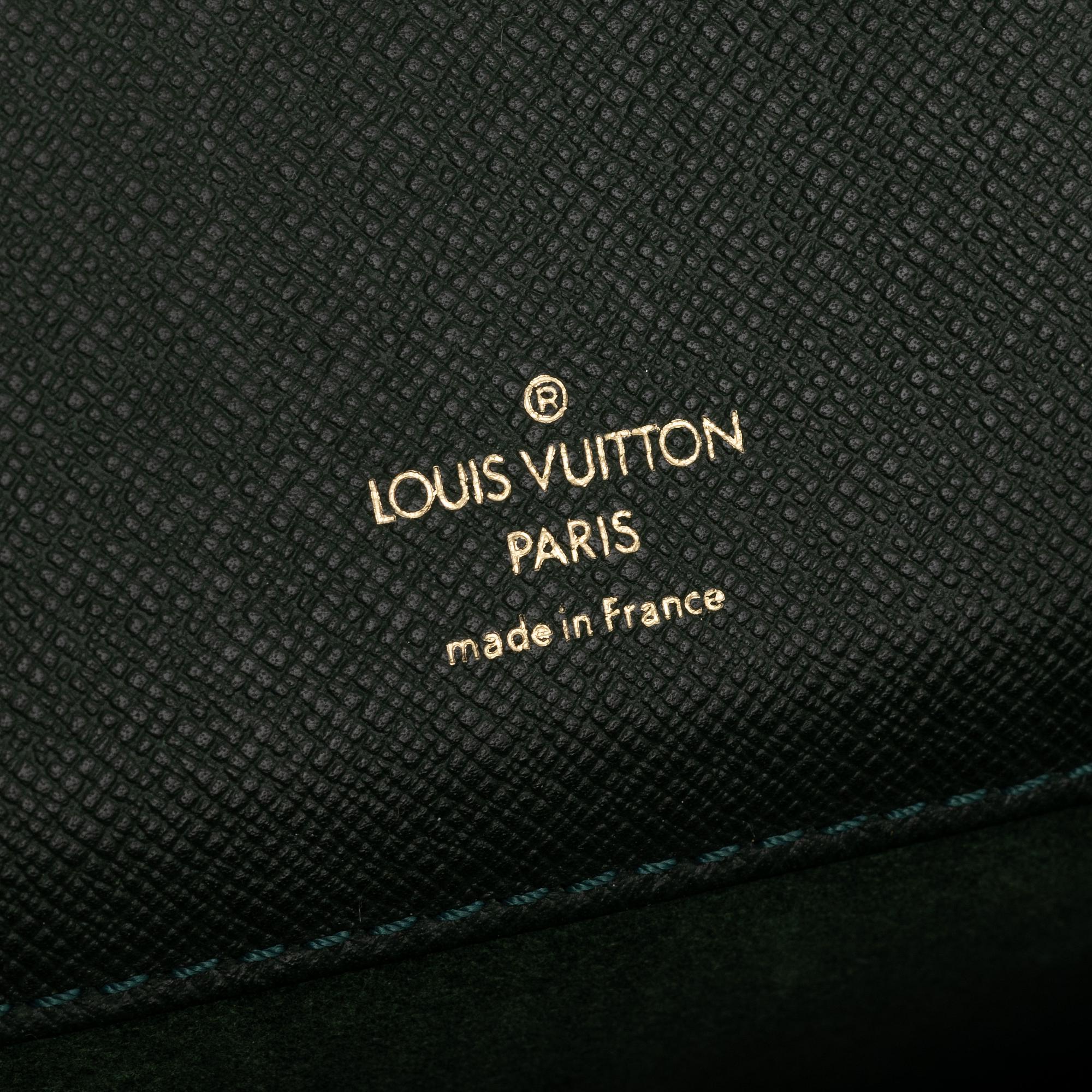 Louis Vuitton, a green Taiga 'Kourad' briefcase, 1997.