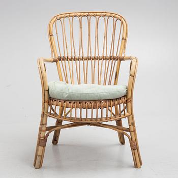 A wicker chair, mid 20th century.