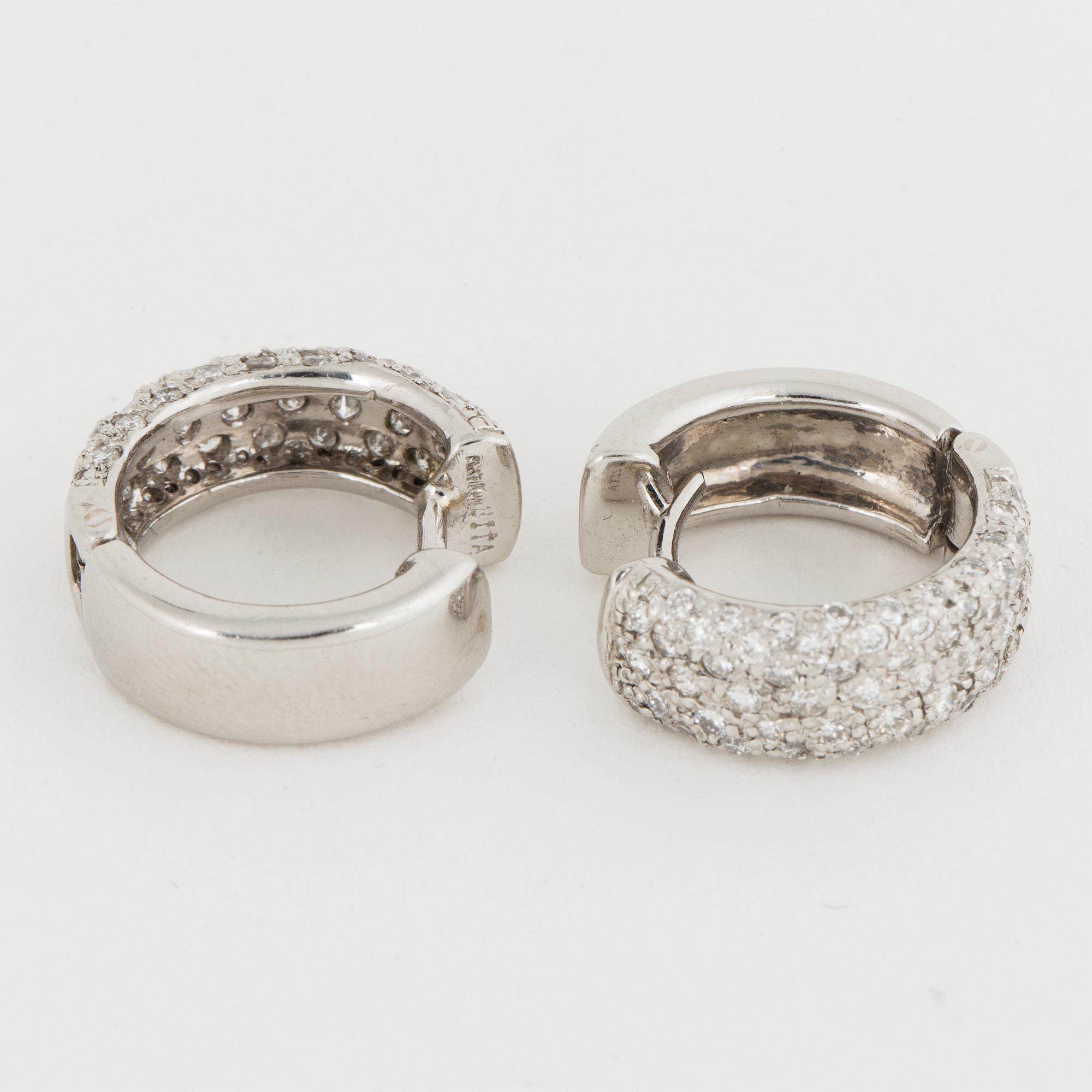Platinum and brilliant-cut diamond earrings.