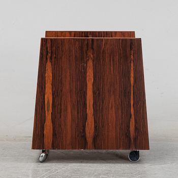 Rolf Hesland, a rosewood newspaper stand, Mellemstrands Trevareindustri, Bruksbo, Norway, 1960's/70's.