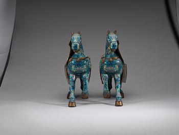 A pair of Chinese cloisonné figures of horses, presumably early 20th Century.