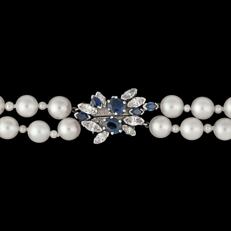 A two strand cultured pearl necklace, 6,8 mm, with blue sapphire and diamond clasp.