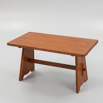 Göran Malmvall, a pine dining table and three chairs, mid 20th century.