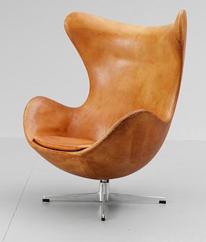 An Arne Jacobsen brown leather 'Egg Chair' by Fritz Hansen, Denmark 1964.