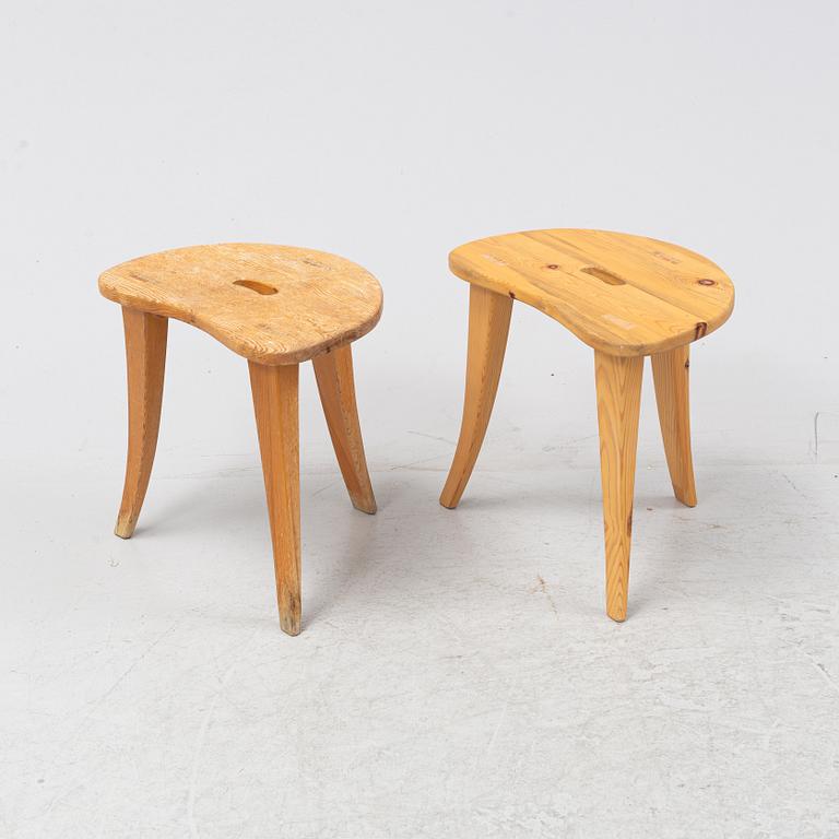 A pair of pine stools by Rune Larssson Ambjörby.