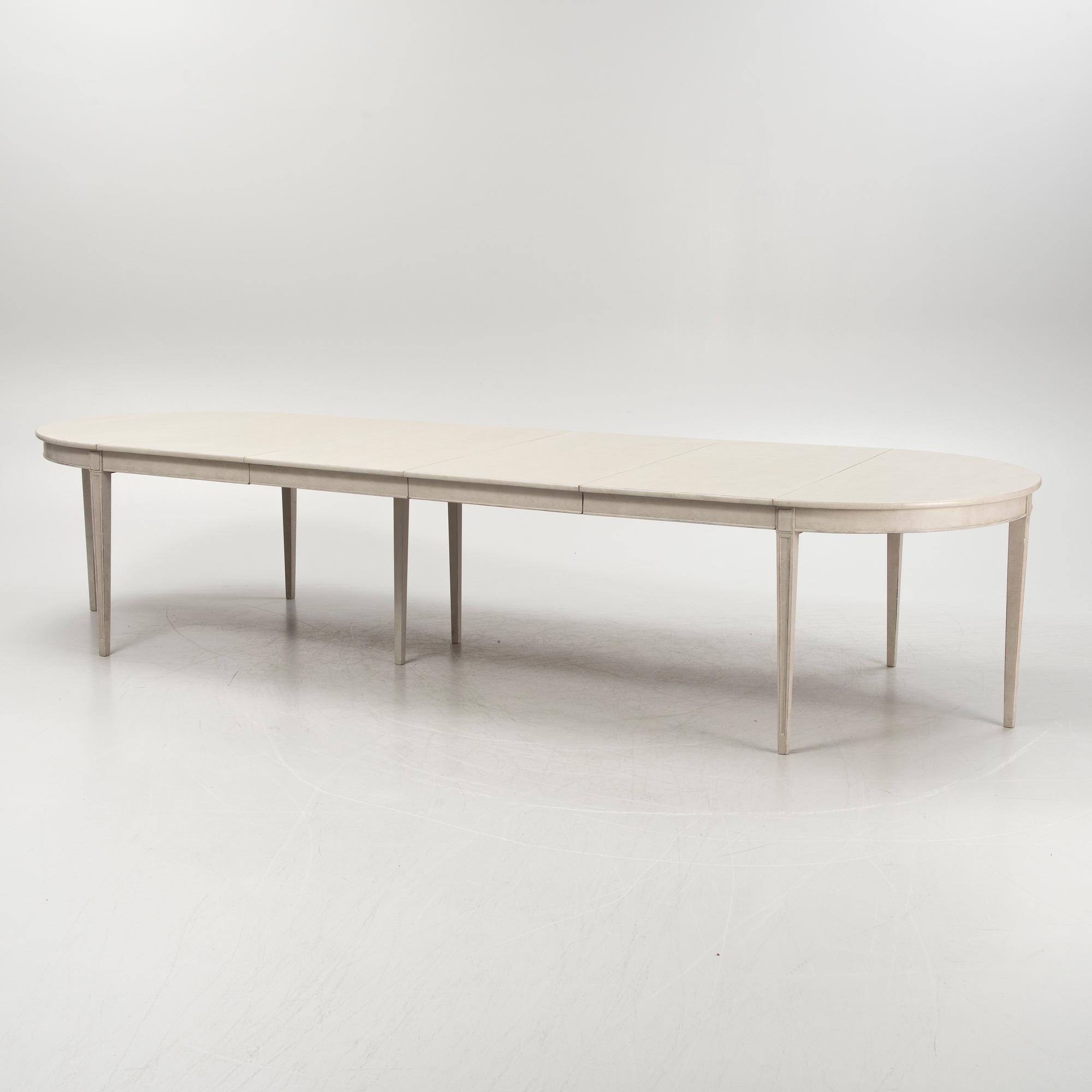 A Gustavian style dining table, first half/mid 20th century.