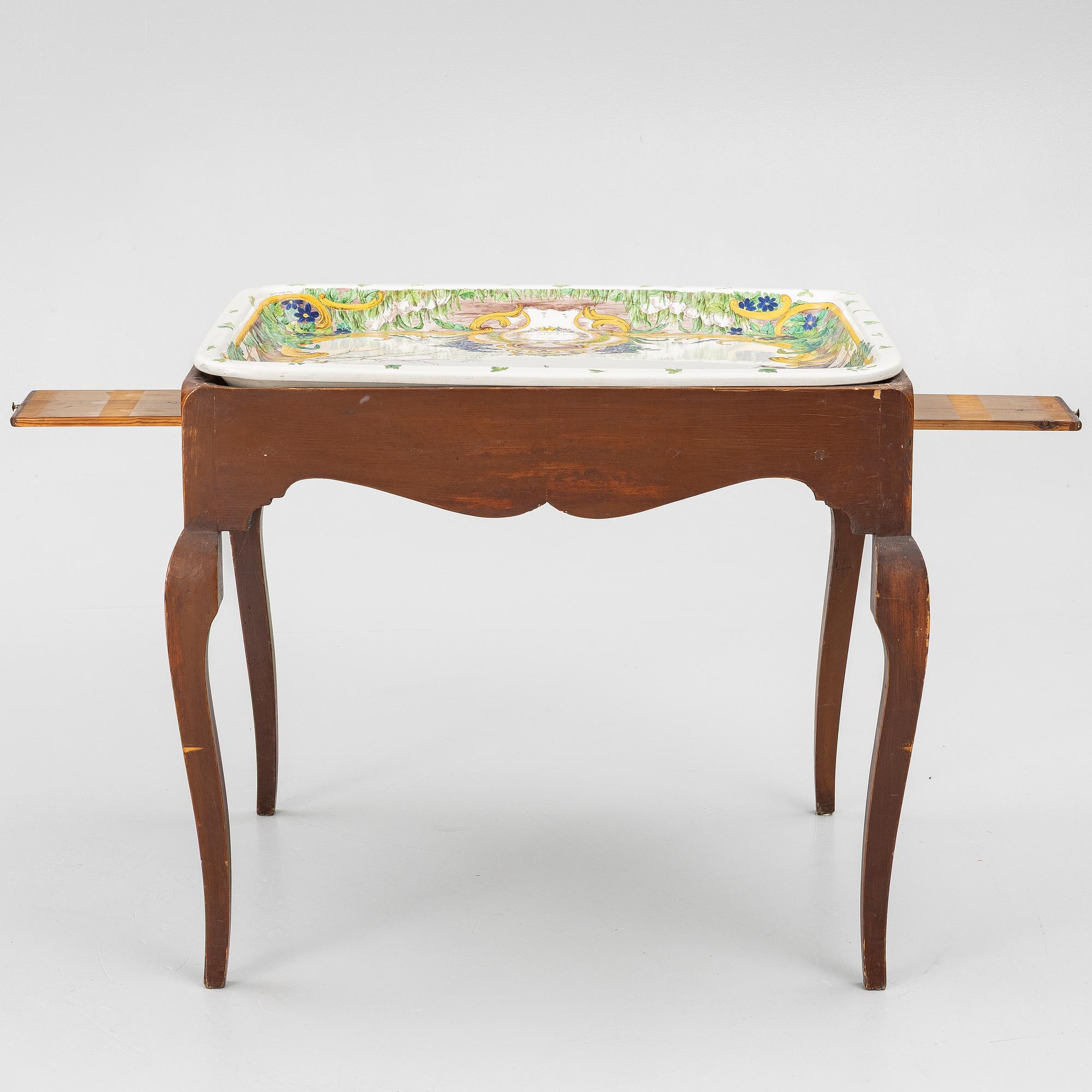 A Swedish rococo tea table with an associated top, 18th and 20th century.