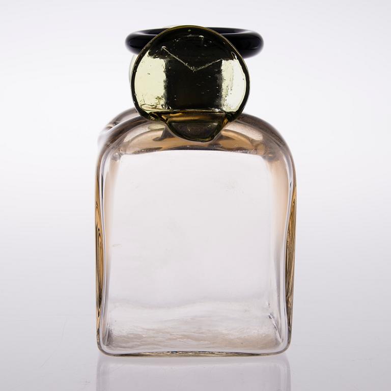 A bottle signed Oiva Toikka, Nuutajärvi Notsjö.