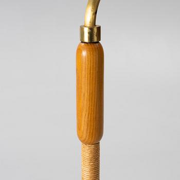 A 1940s Swedish Modern floor lamp.