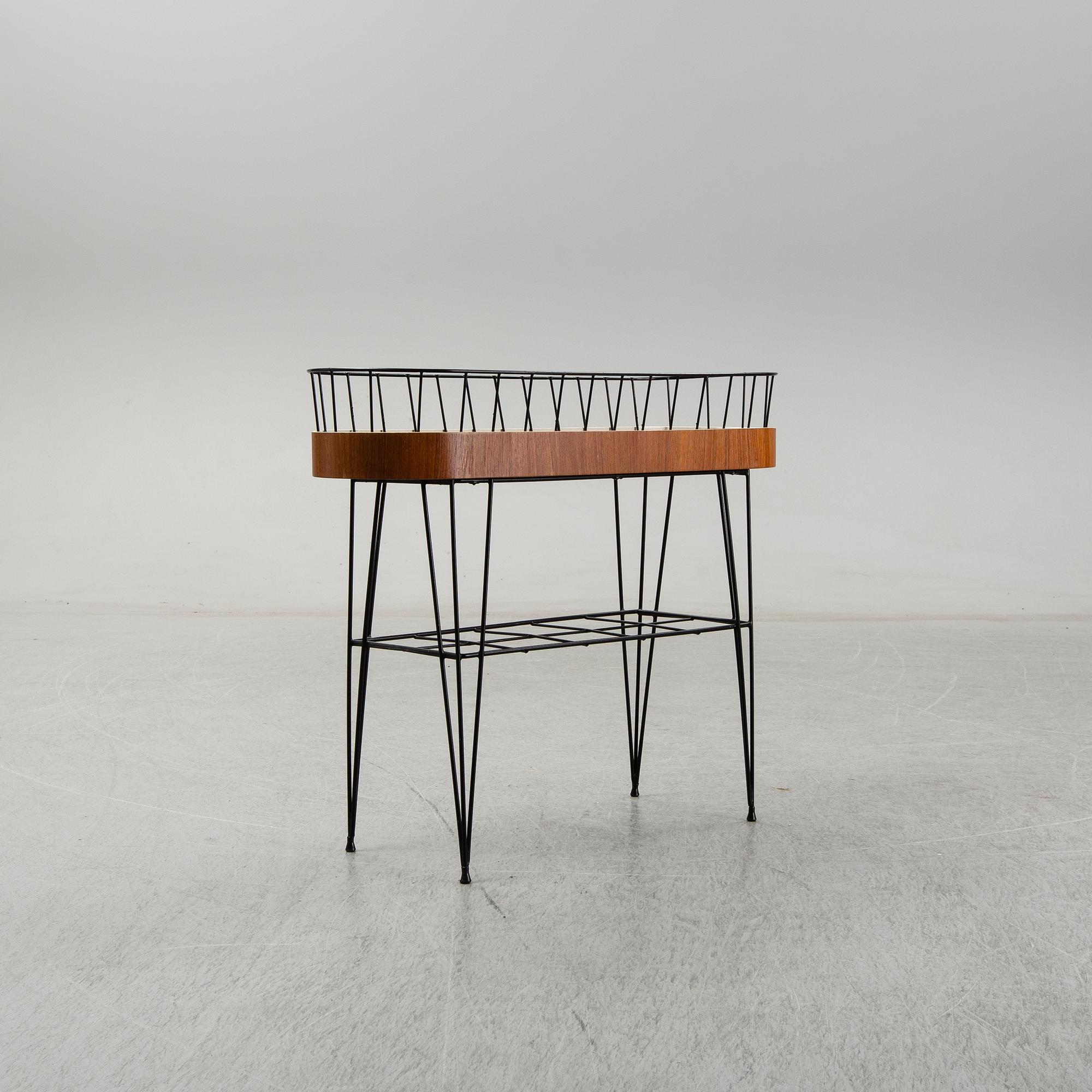 A 1950-60s plant stand.