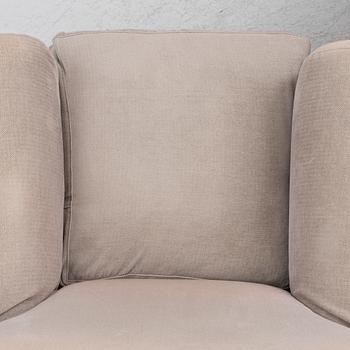 A pair of lounge chairs, 'Nonnamaria', Flexform.