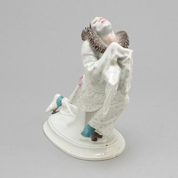 A MEISSEN PORCELAIN FIGURE OF PIERROT FROM THE RUSSIAN BALLET 'CARNAVAL', early 20th century.