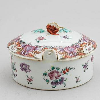 A famille rose butter tureen with cover and two cups with three odd stands, Qing dynasty, Qianlong (1736-95).