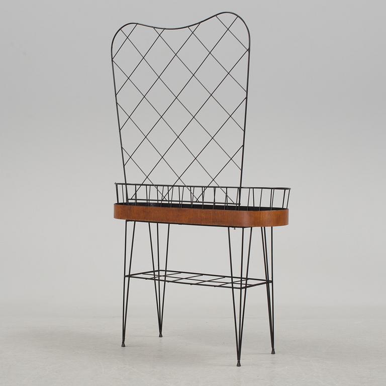 A mid 20th century flower table.