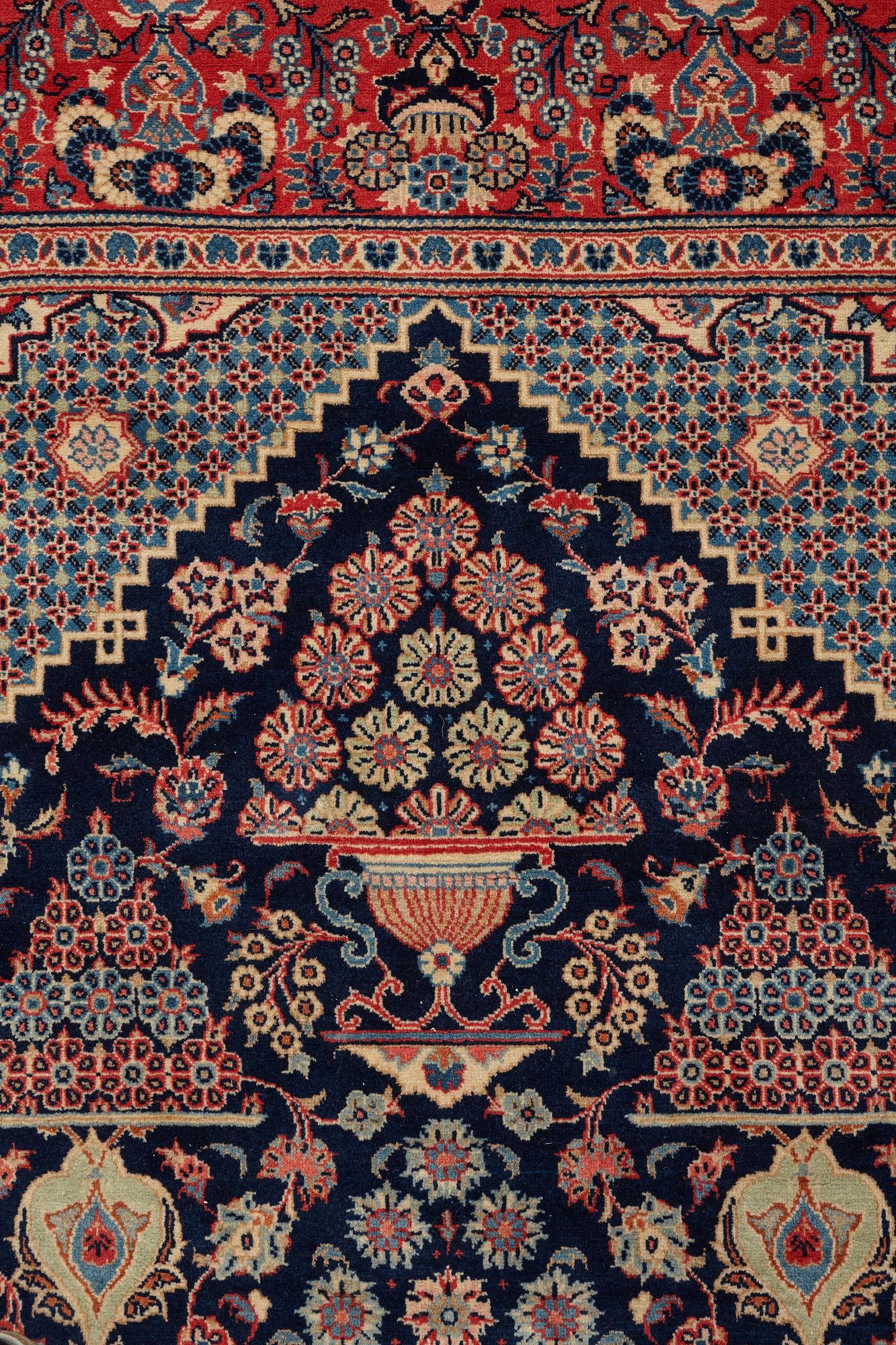 A rug, semi-antique, Kashan, ca 206,5 x 134,5 cm.