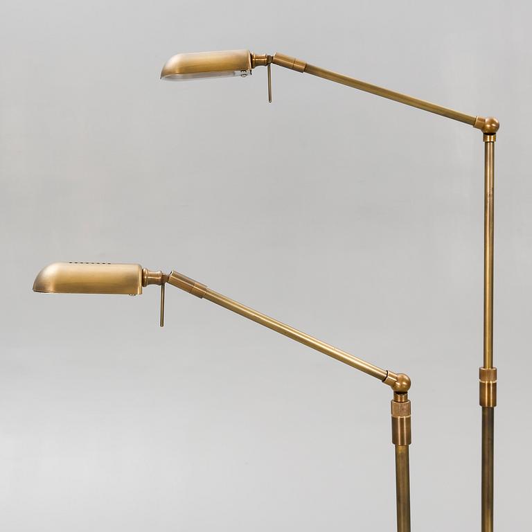 A pair of brass floor lamps 21 st century.