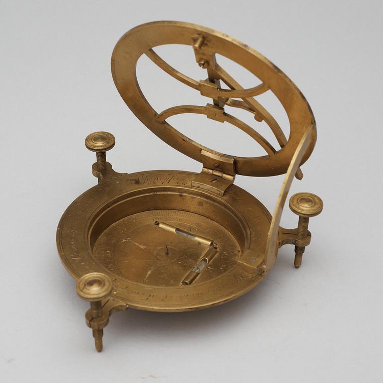 A Russian 18/19th century brass equinoctial sundial.