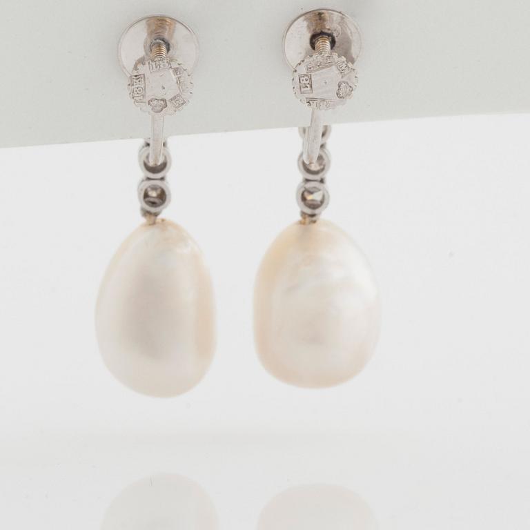 A pair of probably natural pearl and diamond earrings. Total carat weight of diamonds circa 0.54 ct.